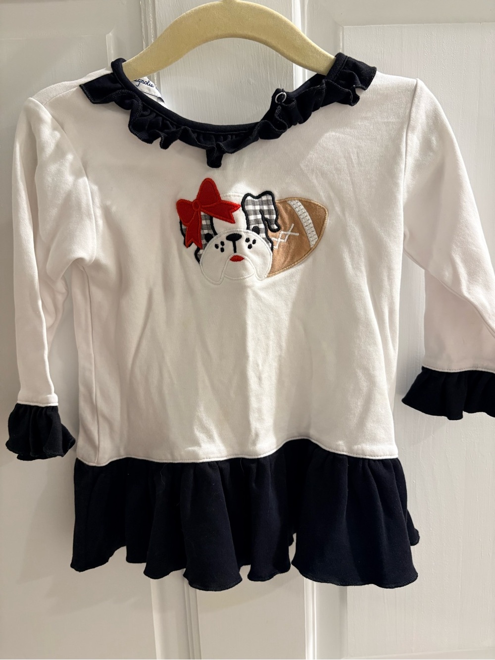 Magnolia White Long-Sleeve Ruffle Hem Top with Puppy & Football Appliqué